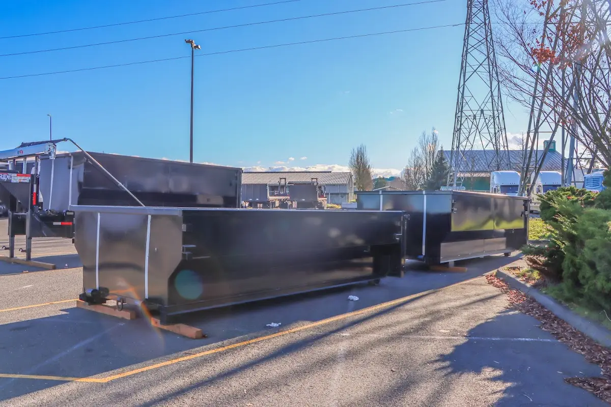 Roll-off dumpster ready for waste disposal at job site for 2 Yard Dumpster Rental in Ridgeway